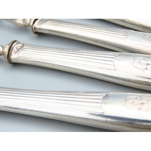 229 - Set of Twelve French Silver Handled Cutlery Spoons Attractively Detailed Each 16cm Long