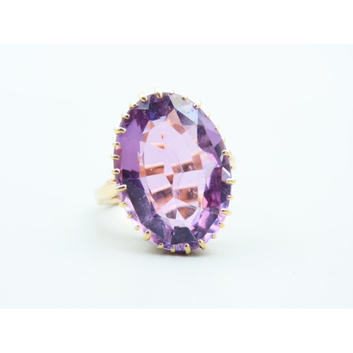 251 - Amethyst Set Oval Cut Single Stone Ring Mounted on 9 Carat Gold Band Ring Size M