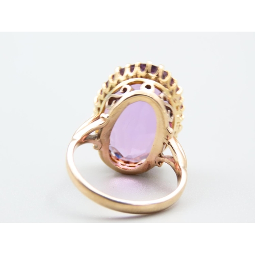 251 - Amethyst Set Oval Cut Single Stone Ring Mounted on 9 Carat Gold Band Ring Size M