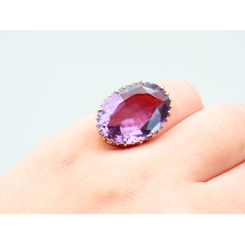 251 - Amethyst Set Oval Cut Single Stone Ring Mounted on 9 Carat Gold Band Ring Size M