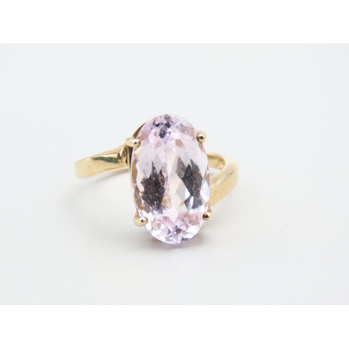 253 - Kunzite Oval Cut Four Claw Set Ladies Centre Stone Ring Mounted on 9 Carat Yellow Gold Band Ring Siz... 