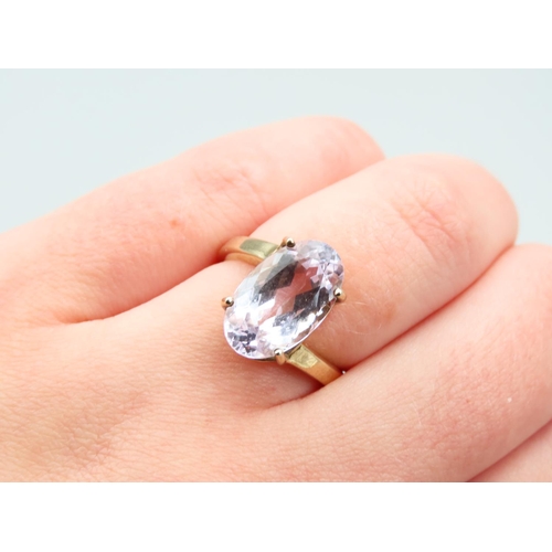 253 - Kunzite Oval Cut Four Claw Set Ladies Centre Stone Ring Mounted on 9 Carat Yellow Gold Band Ring Siz... 