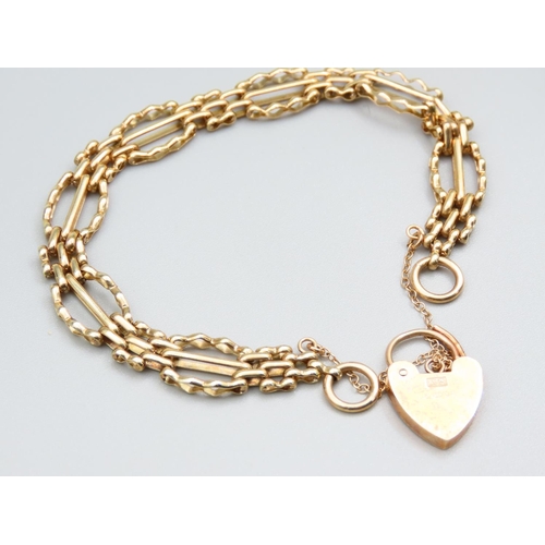 263 - 9 Carat Yellow Gold Bracelet Interlinking Form with Heart Motif Padlock Clasp and Safety Chain Brace... 