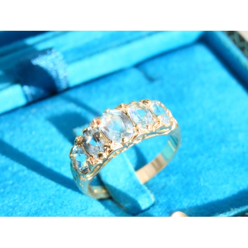 267 - Aquamarine Five Stone Ring Mounted on 9 Carat Yellow Gold Band Ring Size P