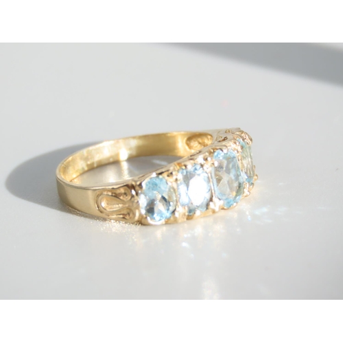 267 - Aquamarine Five Stone Ring Mounted on 9 Carat Yellow Gold Band Ring Size P