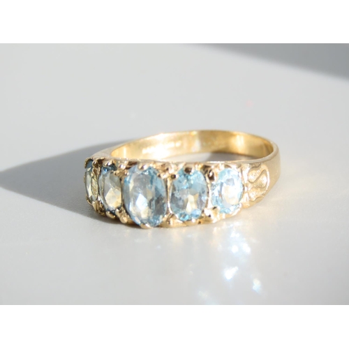 267 - Aquamarine Five Stone Ring Mounted on 9 Carat Yellow Gold Band Ring Size P