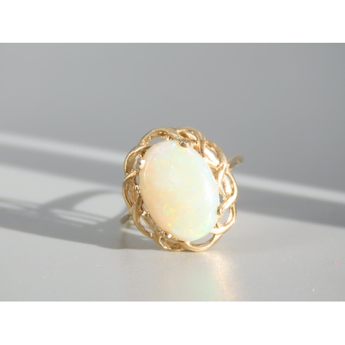 268 - Opal Set Centre Stone Ring Mounted on 9 Carat Yellow Gold Band Ring Size P