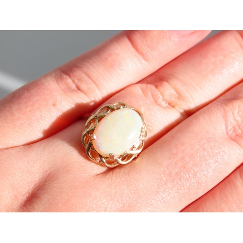 268 - Opal Set Centre Stone Ring Mounted on 9 Carat Yellow Gold Band Ring Size P