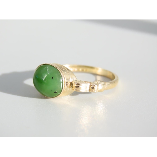 269 - Jade Cabochon Polished Oval Cut Centre Stone Ring Mounted on 9 Carat Yellow Gold Band Ring Size O an... 