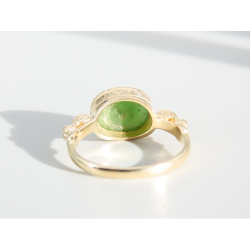 269 - Jade Cabochon Polished Oval Cut Centre Stone Ring Mounted on 9 Carat Yellow Gold Band Ring Size O an... 