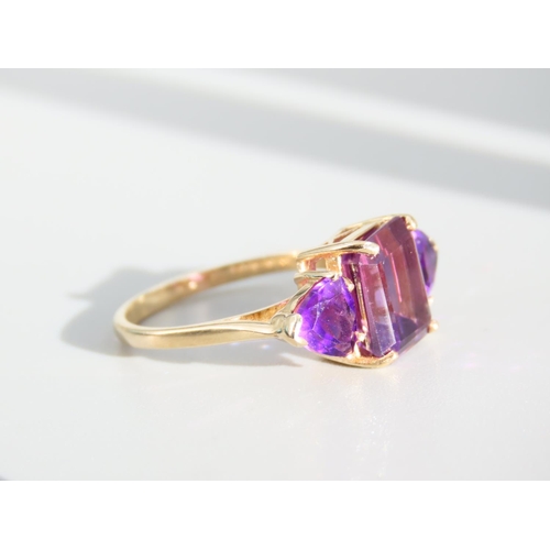 270 - Amethyst Three Stone Ring Mounted on 9 Carat Yellow Gold Band Ring Size N