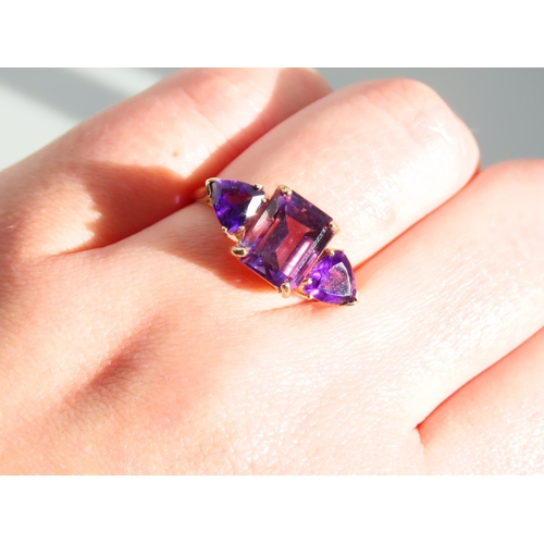 270 - Amethyst Three Stone Ring Mounted on 9 Carat Yellow Gold Band Ring Size N