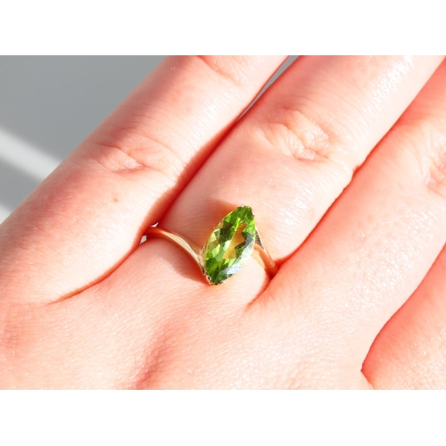 272 - Peridot Ladies Ring Mounted on 9 Carat Yellow Gold Band Ring Size O and A Half