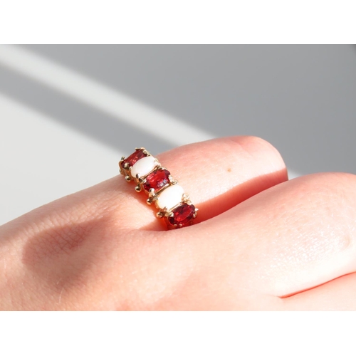 273 - Opal and Garnet Ladies Five Stone Ring Mounted on 9 Carat Yellow Gold Band Ring Size N