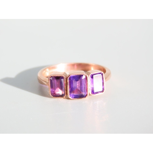 274 - Amethyst Three Stone Ring Mounted on 9 Carat Rose Gold Band Ring Size O