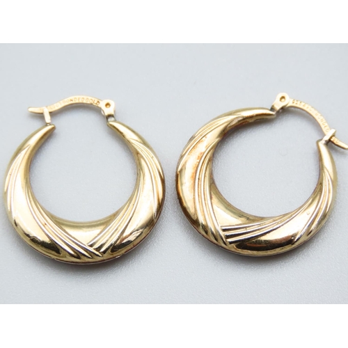 288 - Pair of 9 Carat Yellow Gold Ladies Hoop Earrings Incised Detailing Each Approximately 2cm Diameter