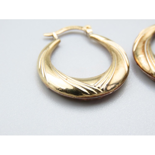 288 - Pair of 9 Carat Yellow Gold Ladies Hoop Earrings Incised Detailing Each Approximately 2cm Diameter