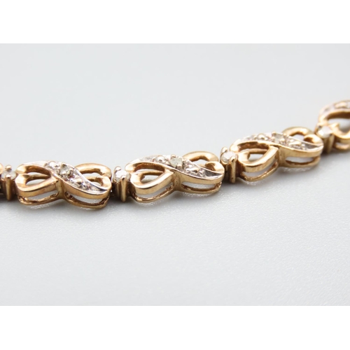 297 - Diamond Set Ladies 9 Carat Yellow Gold Bracelet 20cm Long Articulated Form