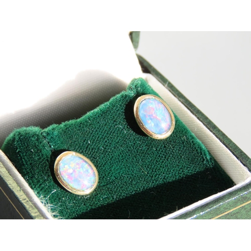 322 - Pair of 9 Carat Opal Set Oval Cut Earrings Each 1cm High