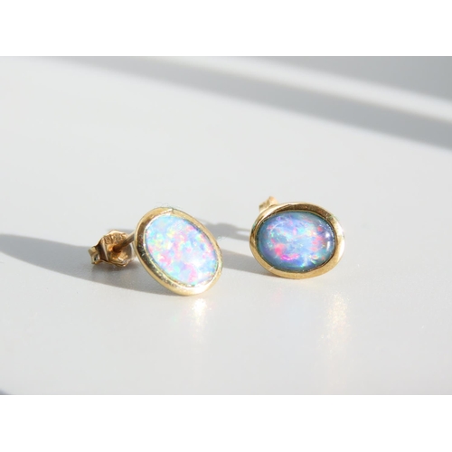 322 - Pair of 9 Carat Opal Set Oval Cut Earrings Each 1cm High