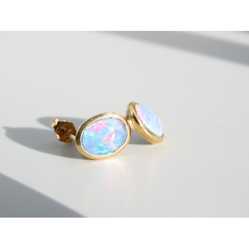 322 - Pair of 9 Carat Opal Set Oval Cut Earrings Each 1cm High