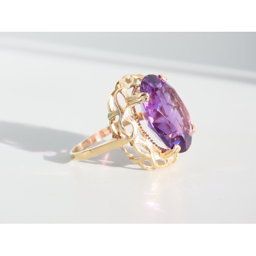 327 - Amethyst Centre Stone Ring Oval Facet Cut Set on 9 Carat Yellow Gold Band Ring Size O and A Half