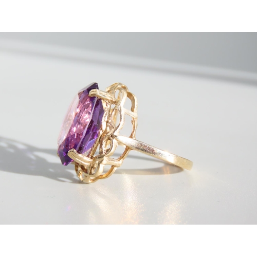 327 - Amethyst Centre Stone Ring Oval Facet Cut Set on 9 Carat Yellow Gold Band Ring Size O and A Half