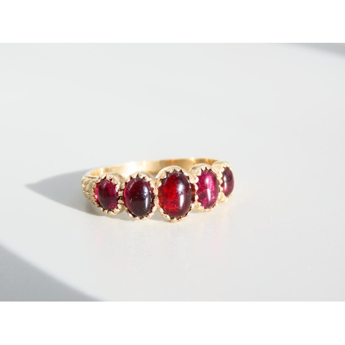 329 - Five Stone Cabochon Cut Polished Garnet Ring Mounted on 9 Carat Yellow Gold Band Ring Size P