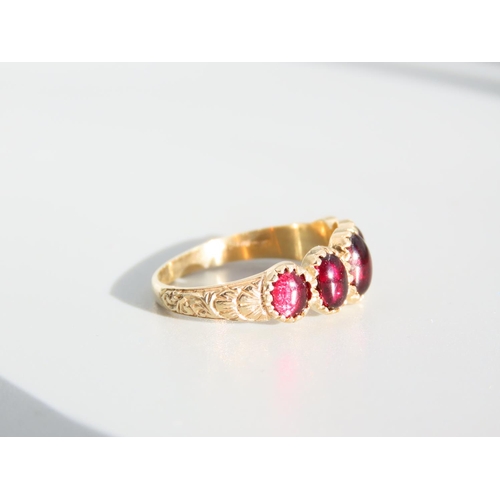 329 - Five Stone Cabochon Cut Polished Garnet Ring Mounted on 9 Carat Yellow Gold Band Ring Size P