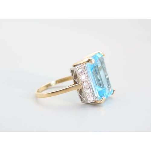 333 - Blue Topaz Emerald Cut Diamond Set Ring Mounted on 9 Carat Yellow Gold Band Ring Size O