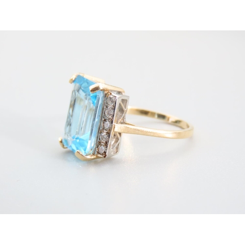 333 - Blue Topaz Emerald Cut Diamond Set Ring Mounted on 9 Carat Yellow Gold Band Ring Size O