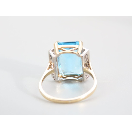 333 - Blue Topaz Emerald Cut Diamond Set Ring Mounted on 9 Carat Yellow Gold Band Ring Size O