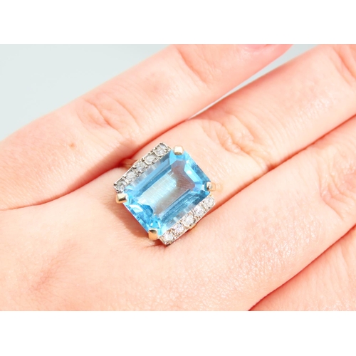 333 - Blue Topaz Emerald Cut Diamond Set Ring Mounted on 9 Carat Yellow Gold Band Ring Size O