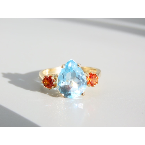 336 - Blue Topaz and Citrine Three Stone Ring Set on 9 Carat Yellow Gold Band Ring Size O