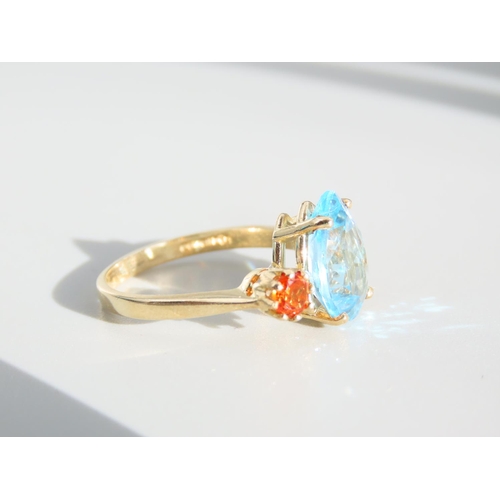 336 - Blue Topaz and Citrine Three Stone Ring Set on 9 Carat Yellow Gold Band Ring Size O