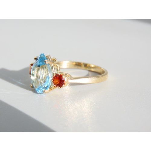 336 - Blue Topaz and Citrine Three Stone Ring Set on 9 Carat Yellow Gold Band Ring Size O