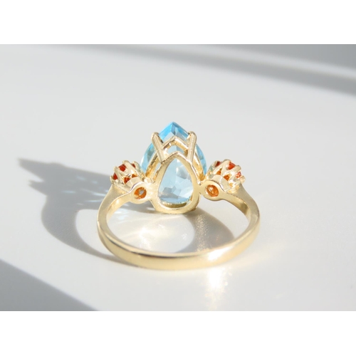 336 - Blue Topaz and Citrine Three Stone Ring Set on 9 Carat Yellow Gold Band Ring Size O