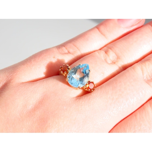 336 - Blue Topaz and Citrine Three Stone Ring Set on 9 Carat Yellow Gold Band Ring Size O