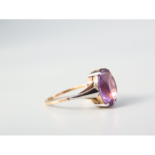 351 - Amethyst Centre Stone Ladies Ring Four Claw Setting Mounted on 9 Carat Yellow Gold Band Ring Size K