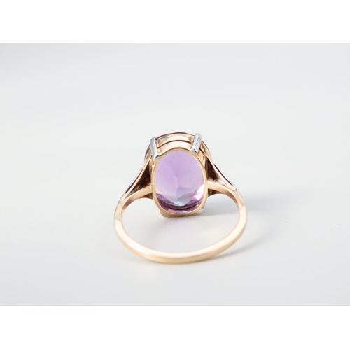 351 - Amethyst Centre Stone Ladies Ring Four Claw Setting Mounted on 9 Carat Yellow Gold Band Ring Size K