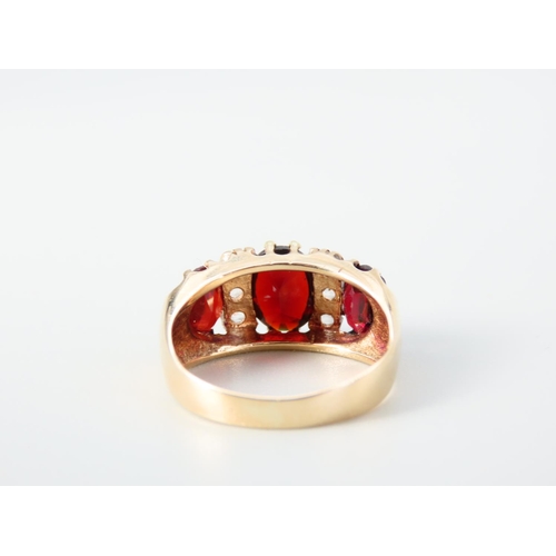 352 - Three Stone Garnet Ladies Ring Mounted on 9 Carat Yellow Gold Band Ring Size N