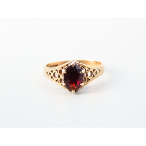 356 - Red Garnet Ladies Centre Stone Ring Claw Set Mounted on 9 Carat Yellow Gold Band Ring Size N