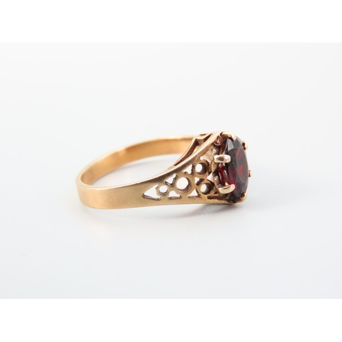 356 - Red Garnet Ladies Centre Stone Ring Claw Set Mounted on 9 Carat Yellow Gold Band Ring Size N