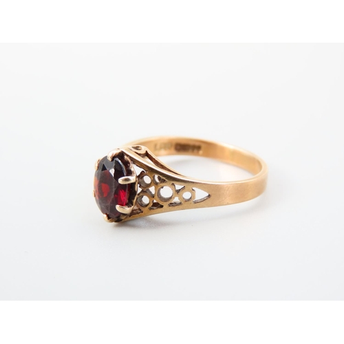 356 - Red Garnet Ladies Centre Stone Ring Claw Set Mounted on 9 Carat Yellow Gold Band Ring Size N