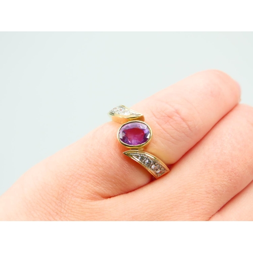 374 - 18 Carat Yellow Gold Diamond Set Amethyst Centre Stone Ring Size I