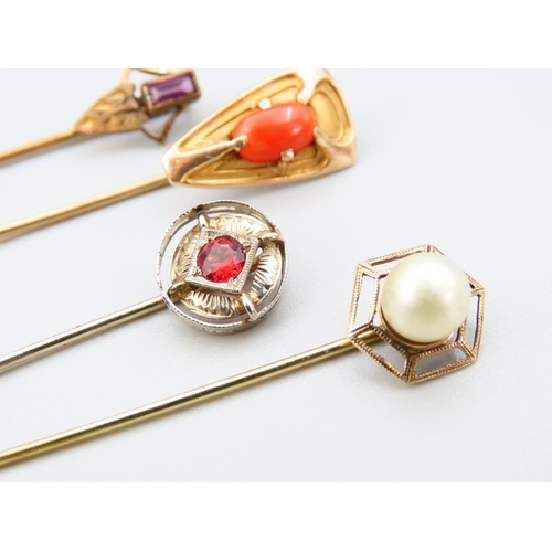 375 - Four Gold Stick Pins Garnet Pearl and Amethyst Decoration Each Tallest Approximately 7cm Long