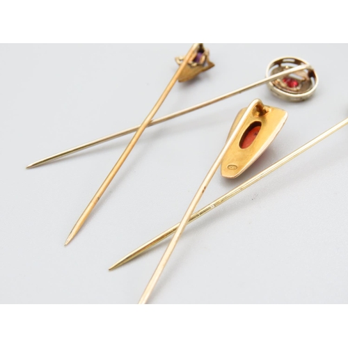 375 - Four Gold Stick Pins Garnet Pearl and Amethyst Decoration Each Tallest Approximately 7cm Long