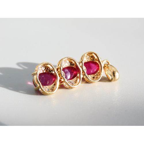 383 - Three Ruby Drop Pendant Cabochon Cut Set in 9 Carat Yellow Gold 3cm Drop