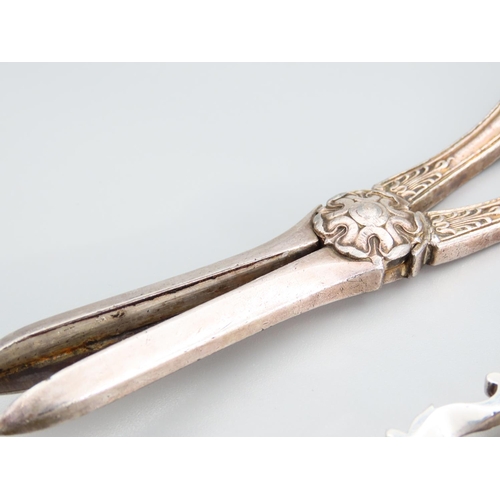 396 - Pair of Silver Sugar Nips Attractively Detailed with Scallop Shell Motif Wells 12cm Long and Silver ... 