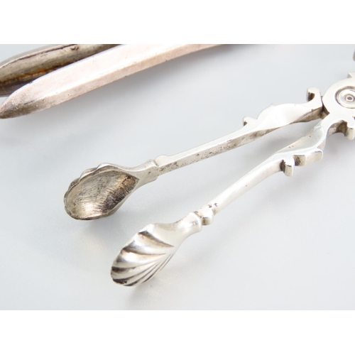 396 - Pair of Silver Sugar Nips Attractively Detailed with Scallop Shell Motif Wells 12cm Long and Silver ... 